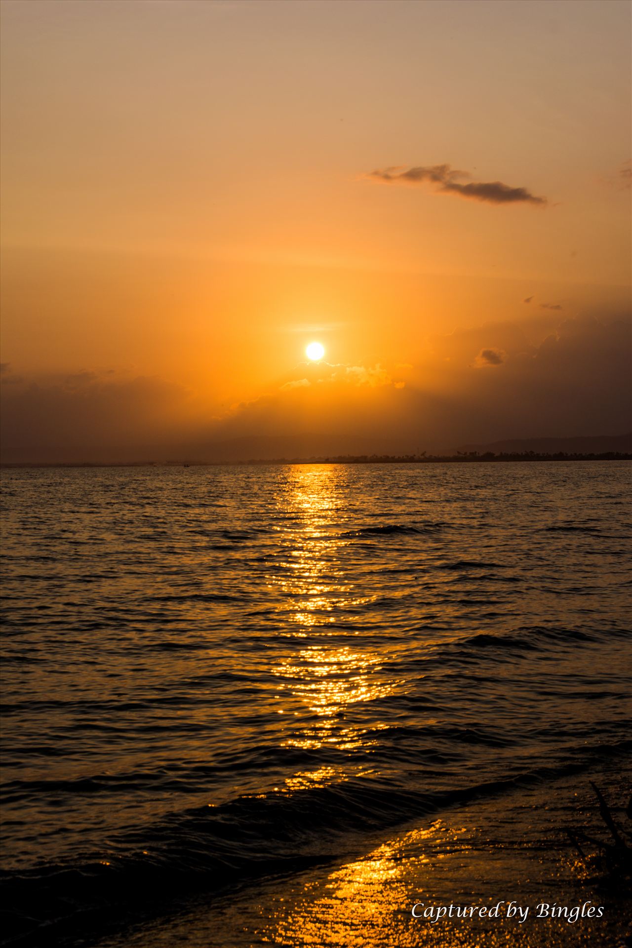 Sunrise in Laguna Bay -  by Bingles
